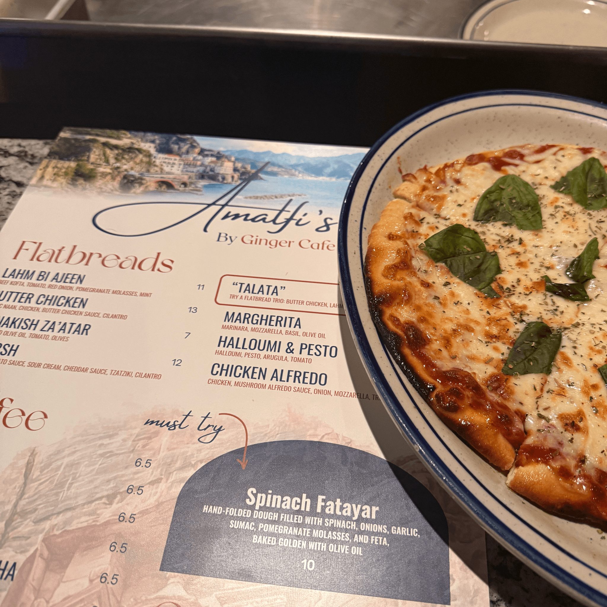 Flatbread Trio (Lahm Bi Ajeen, Manakish Za'atar, and Butter Chicken.